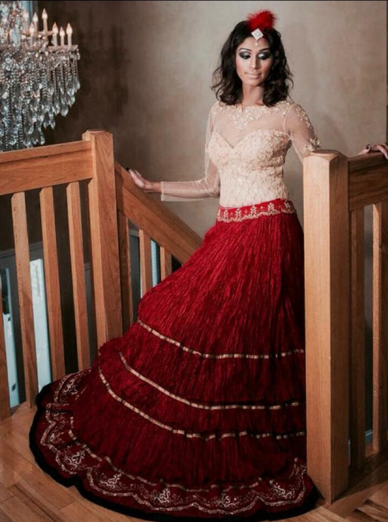 Deep Red Silk crushed Lehenga with Gold bodysuit